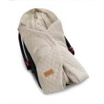 Birdsong swaddle fitted on an infant car seat