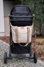 Herbs M stroller bag hanging on the pram handlebar